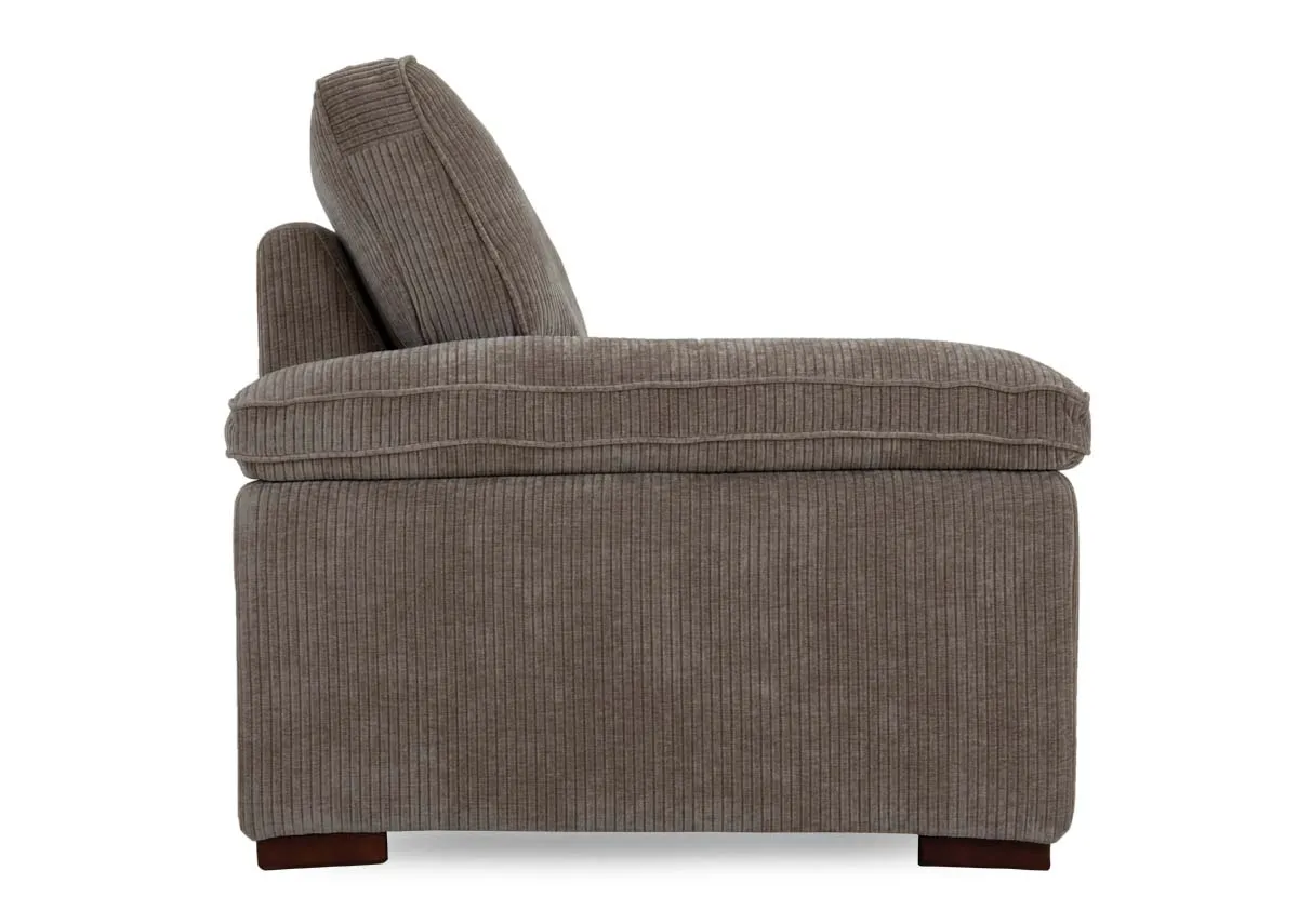 A beige cord fabric armchair from EZ Livings Westport range. Side view