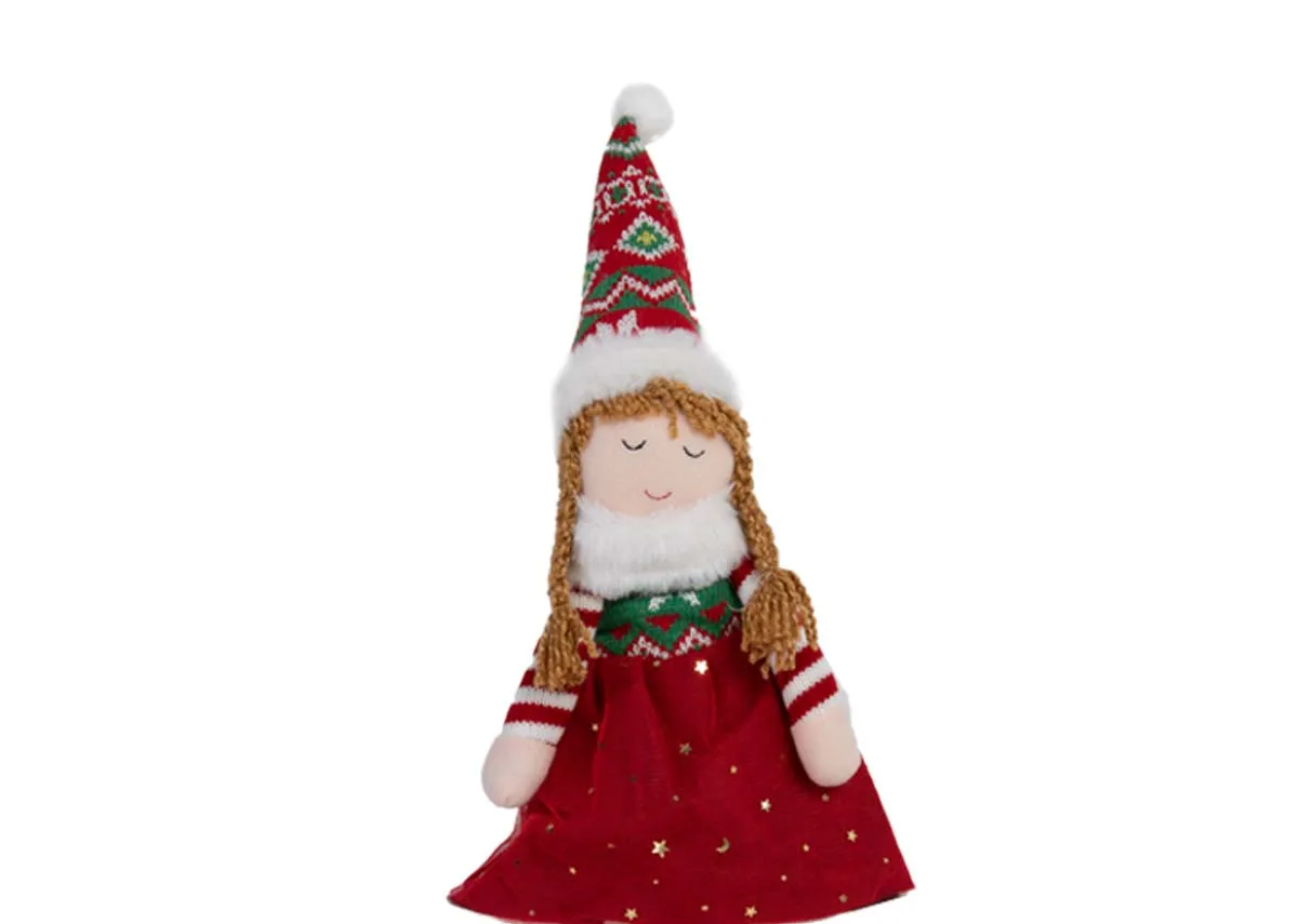 A fabric rag dool figurine with red skirt & hat from EZ Livings Christmas range. Closeup of hat