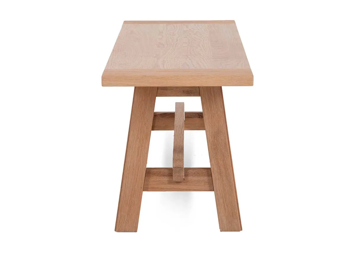 An oak dining bench from EZ Livings Albany range. Side view of textrued finish