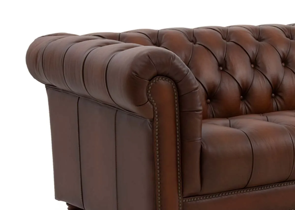 A 3.5 seater roll back brown leather sofa from EZ Livings Adare range. Closeup of curved armrests