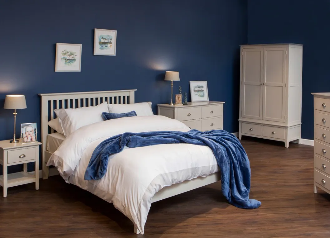 View of one-drawer grey bedside locker with bottom shelf Maine in lifestyle setting