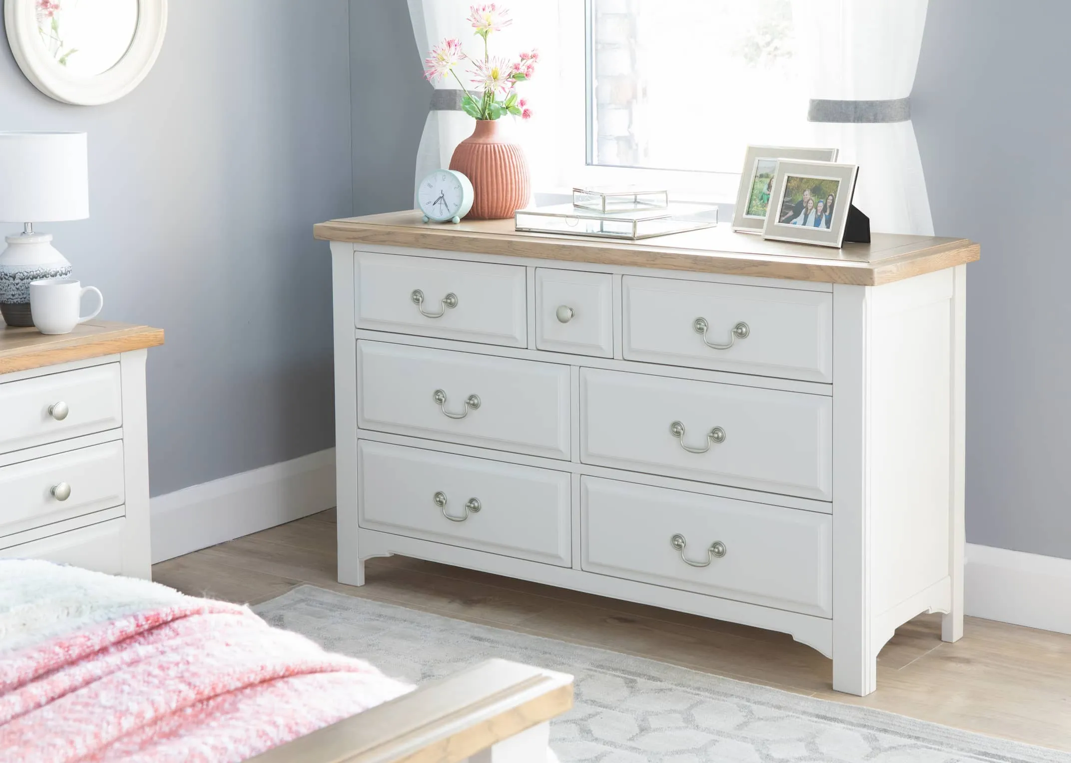 A lifestyle image of the Georgia Chest of drawers with matching furniture