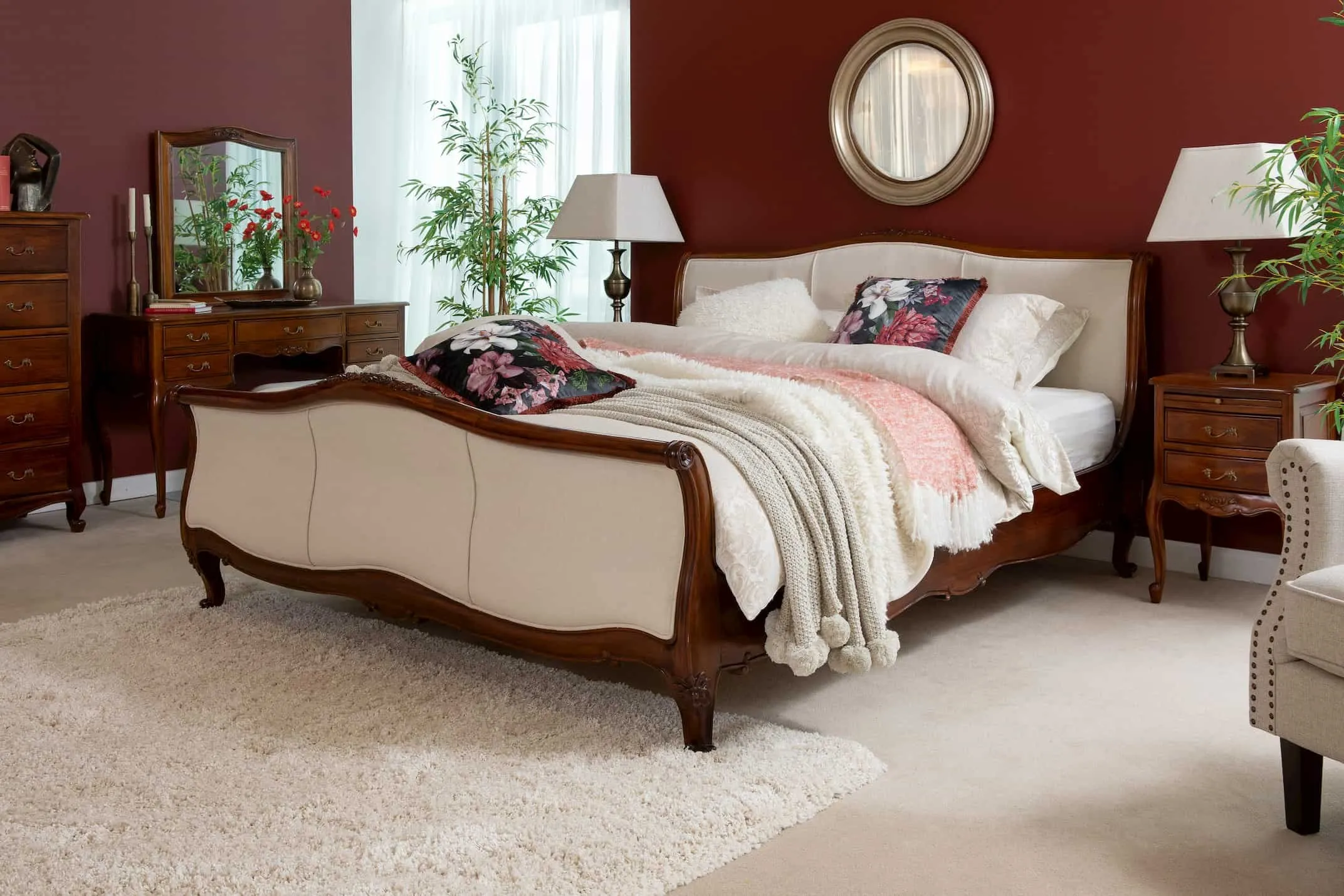 A lifestyle image of the Fabric Lyon bedframe showing the wood finish with the rest of the range.