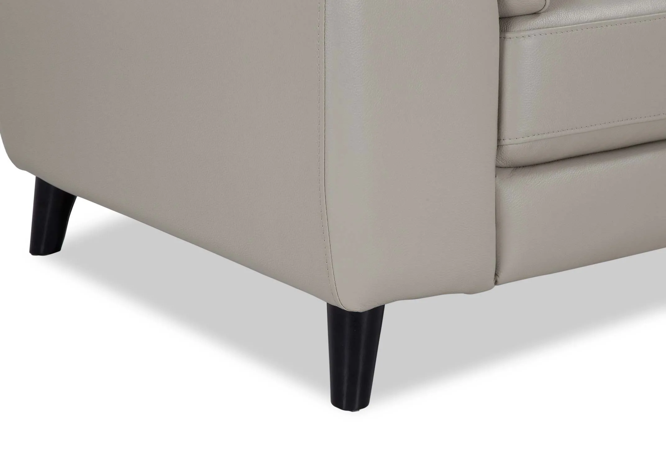 A close up of the dark coloured foot on the Alfredo 2 seater light grey leather sofa.