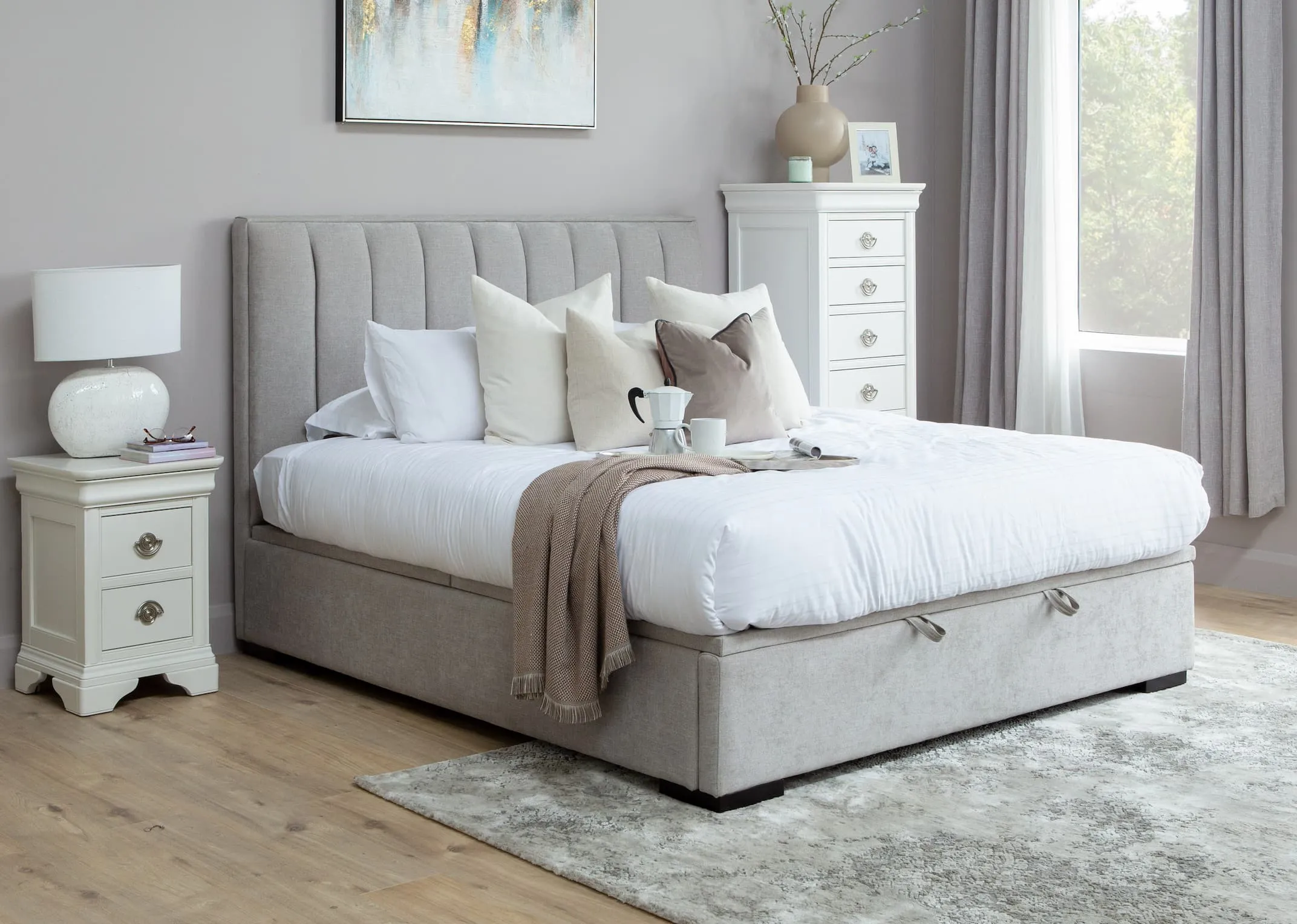 A lifestyle image of the Liberty Grey ottoman with Chantilly locker & tallboy