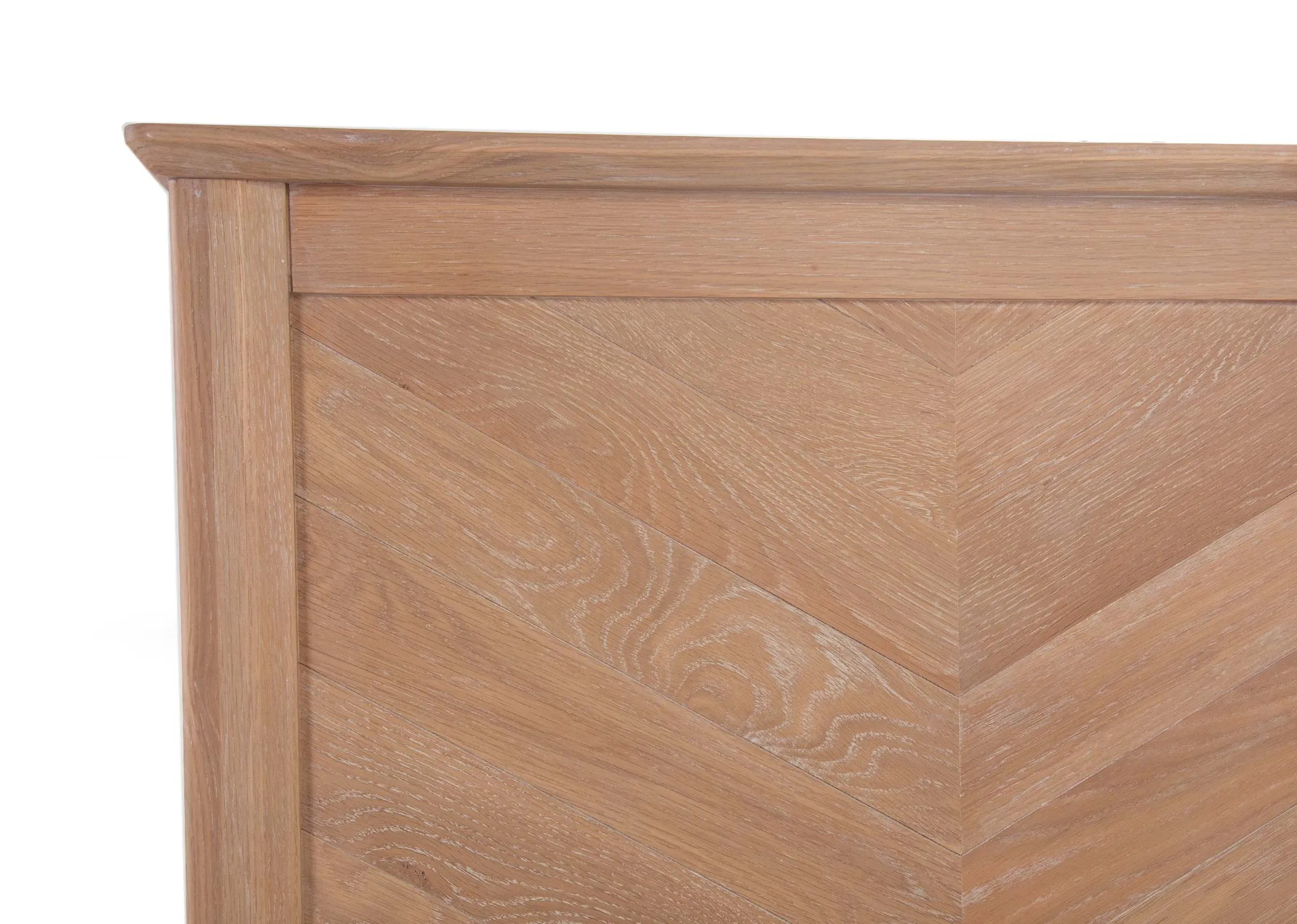 A 5ft chevron wood bedframe with a mattress from EZ Living Furniture's Chevron range. Front view of headboard herringb detail