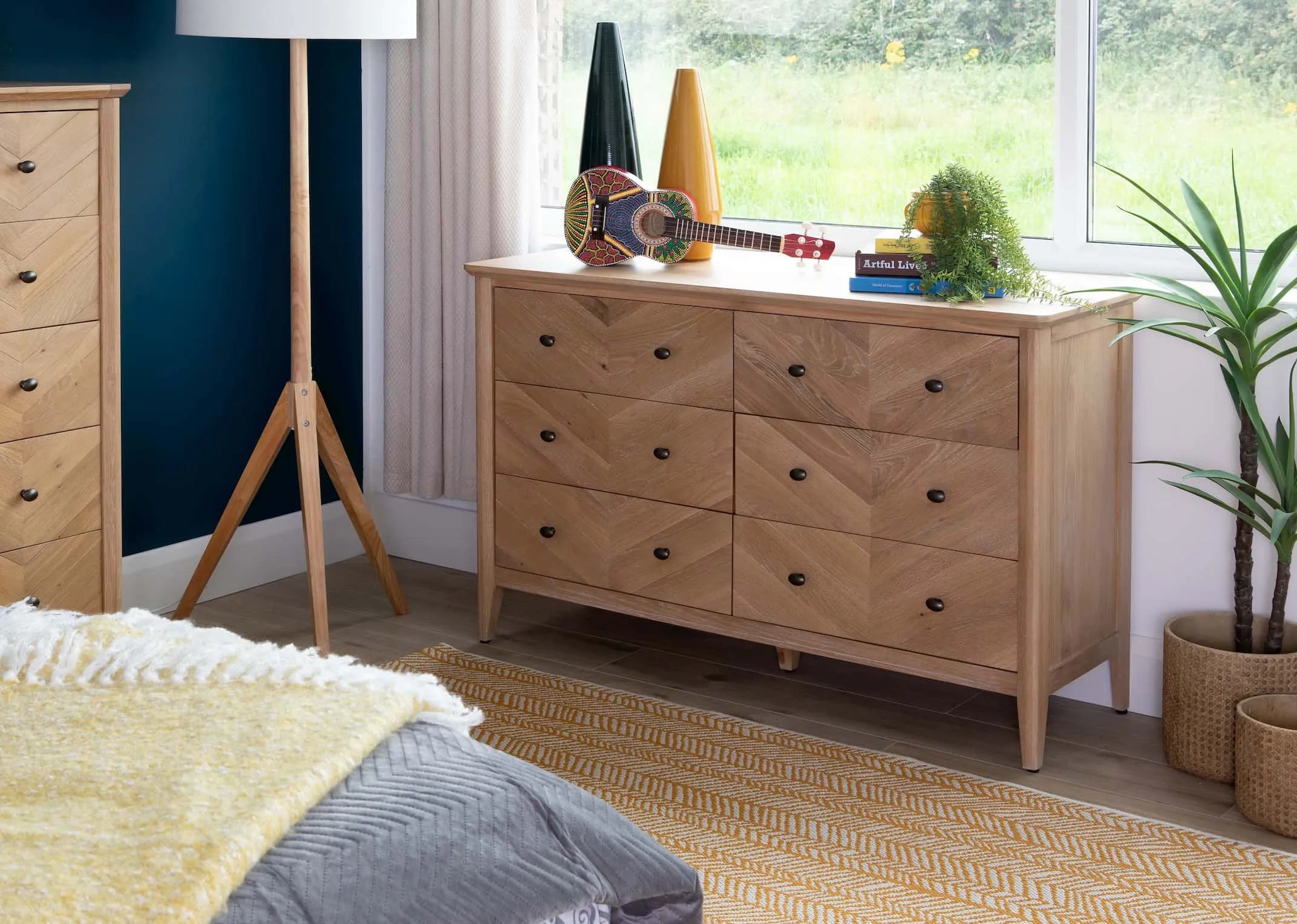 A lifestyle image of the Herringbone Bedroom Chest with Fusion Canvas
