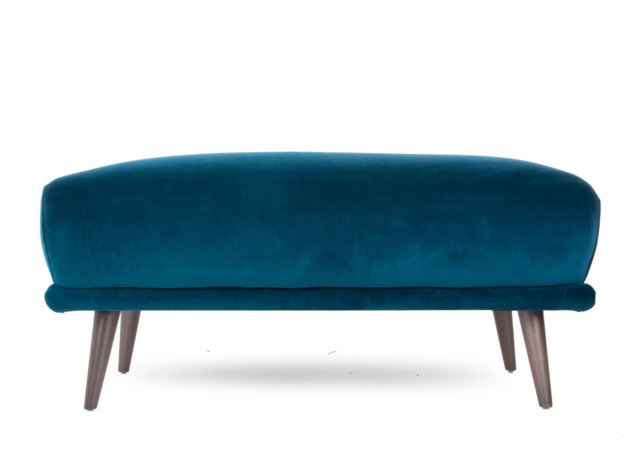 A teal velvet large footstool with wood legs from EZ Living Furniture's Katie range. Front view of long edge