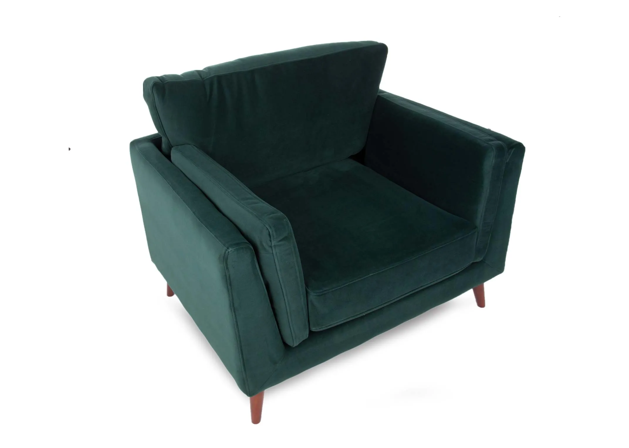 A lifestyle image of the Bellini green armchair with footstool and Carmel display unit