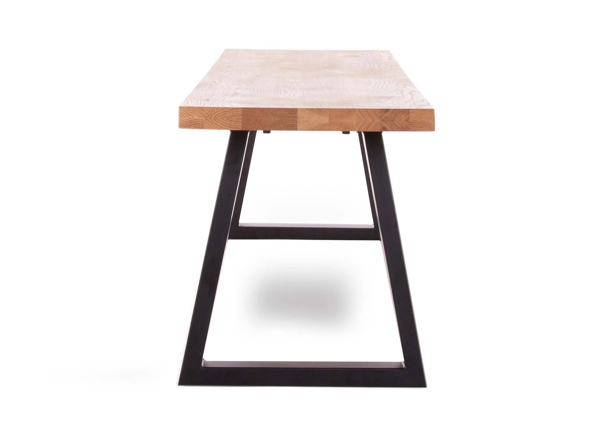 A 200cm oak dining bench with metal legs from EZ Living Furniture's Renvyle range. Side view of the bench