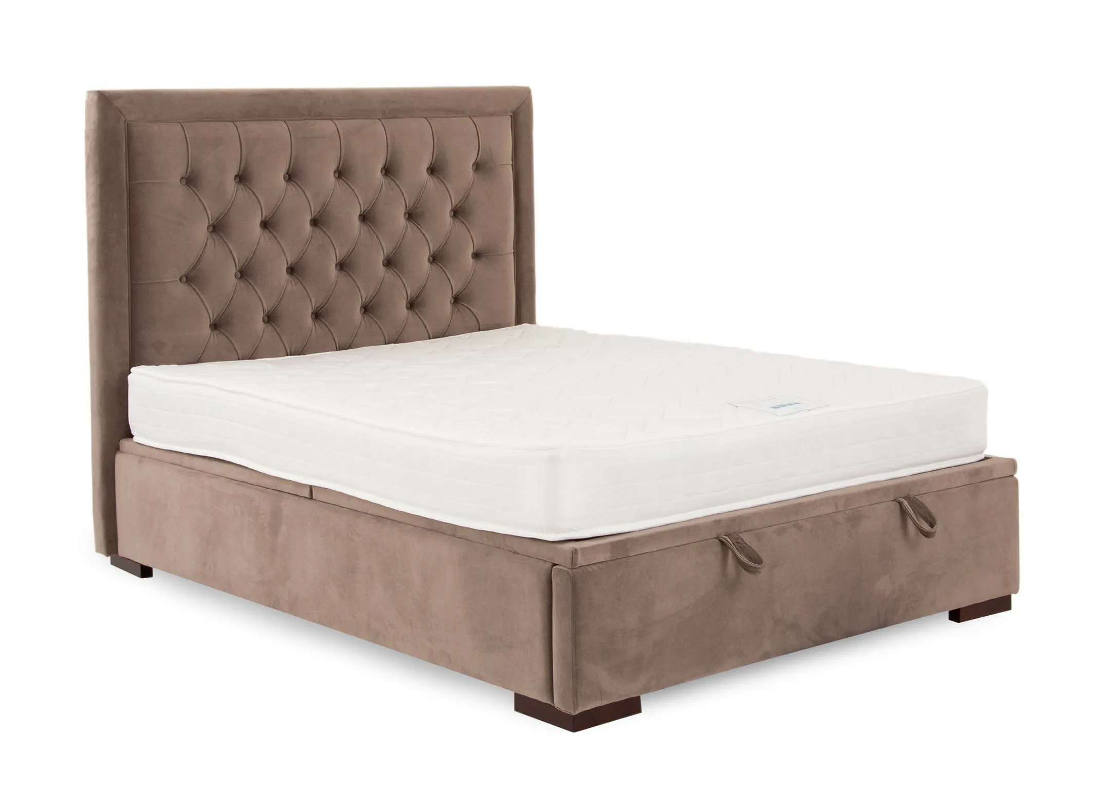 A taupe velvet ottoman bed with tufted high headboard from EZ Livings Majestic range. Angled view of bed with mattress not included.