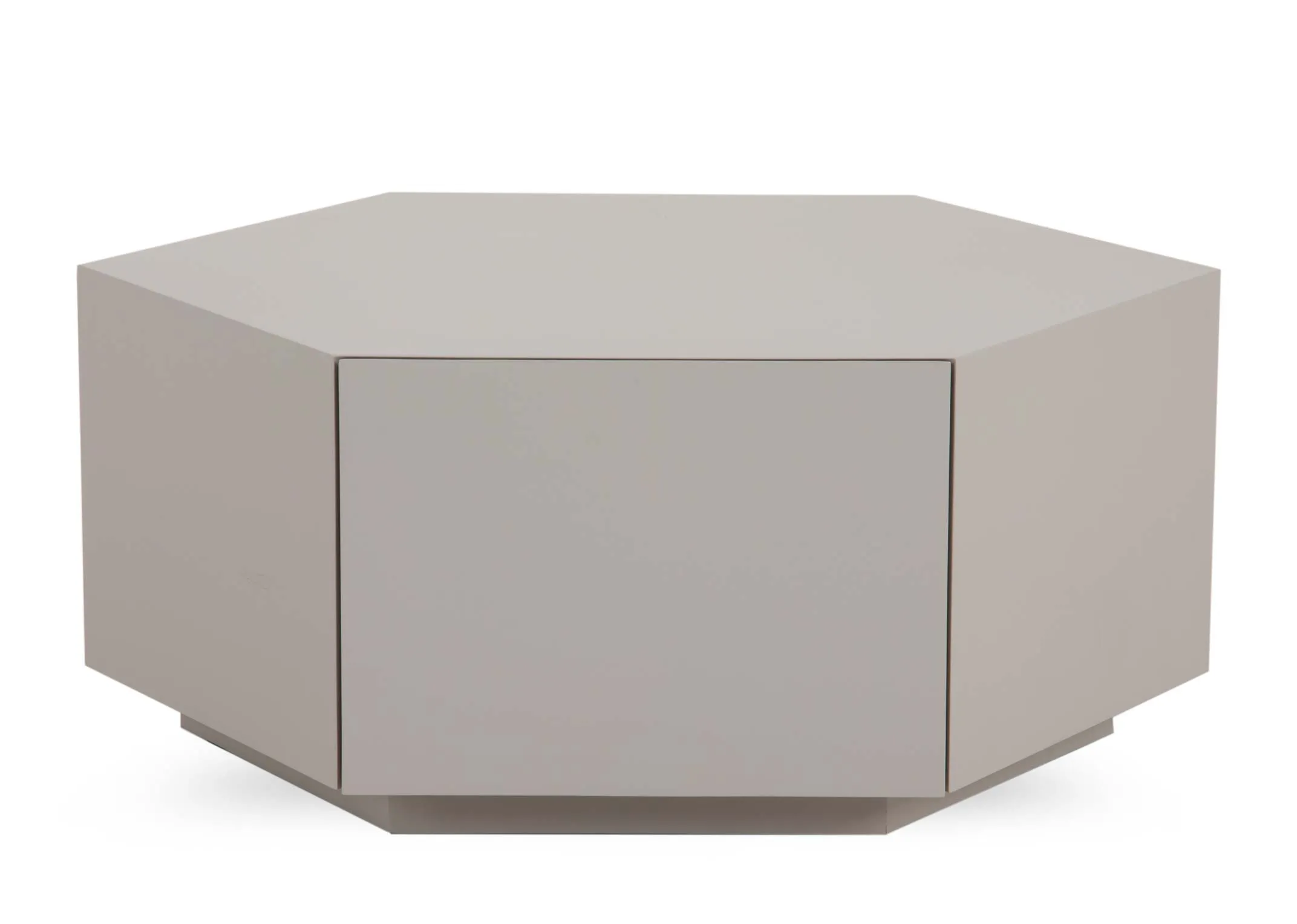 An off-white hexagonal plinth coffee table from EZ Livings Jonas range. Front view of flat fronted table with no handles