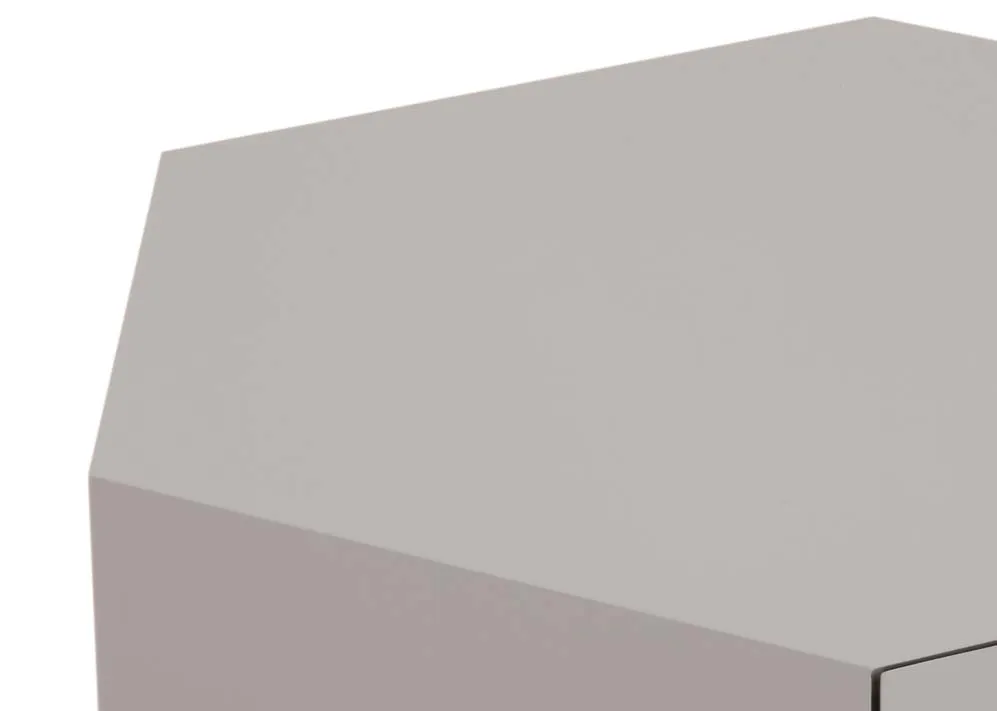 An off-white hexagonal plinth coffee table from EZ Livings Jonas range. Closeup of matt painted finish.