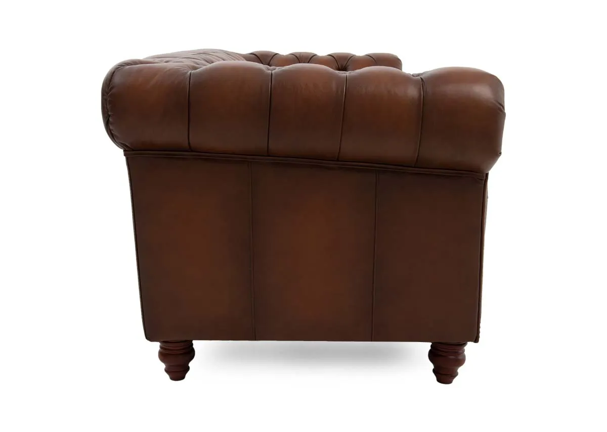 A 3.5 seater roll back brown leather sofa from EZ Livings Adare range. Side view of padded arms