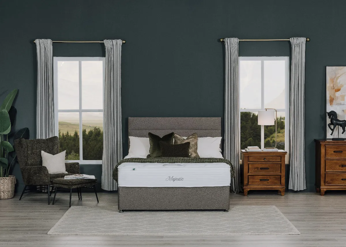 A lifestyle image of a Florence divan with Majestic mattress and Allyson locker.