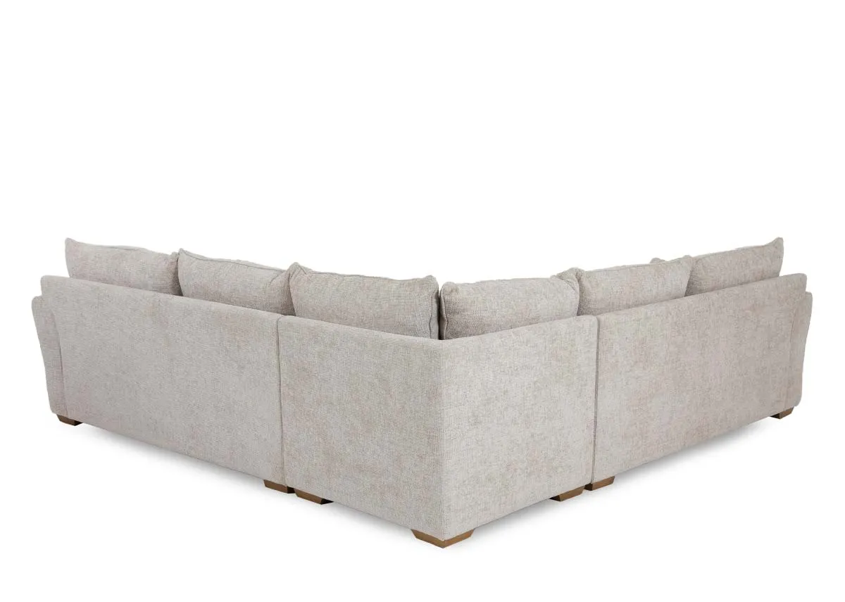 A beige fabric corner sofa from EZ Livings Skyline range.Back view