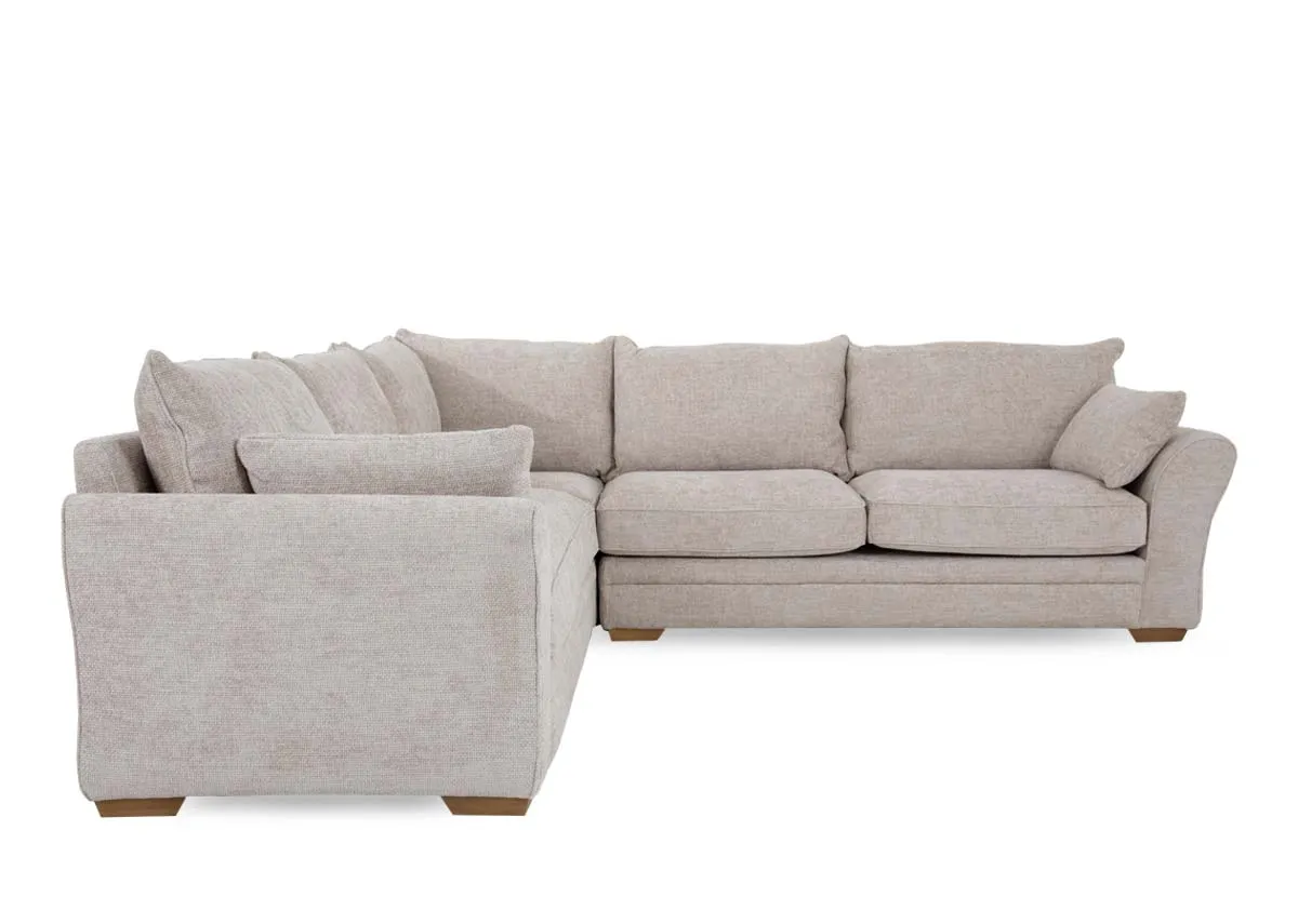 A beige fabric corner sofa from EZ Livings Skyline range.Side view