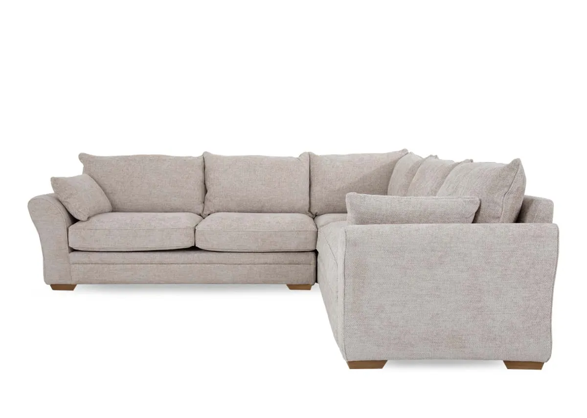 A beige fabric corner sofa from EZ Livings Skyline range.Front view.
