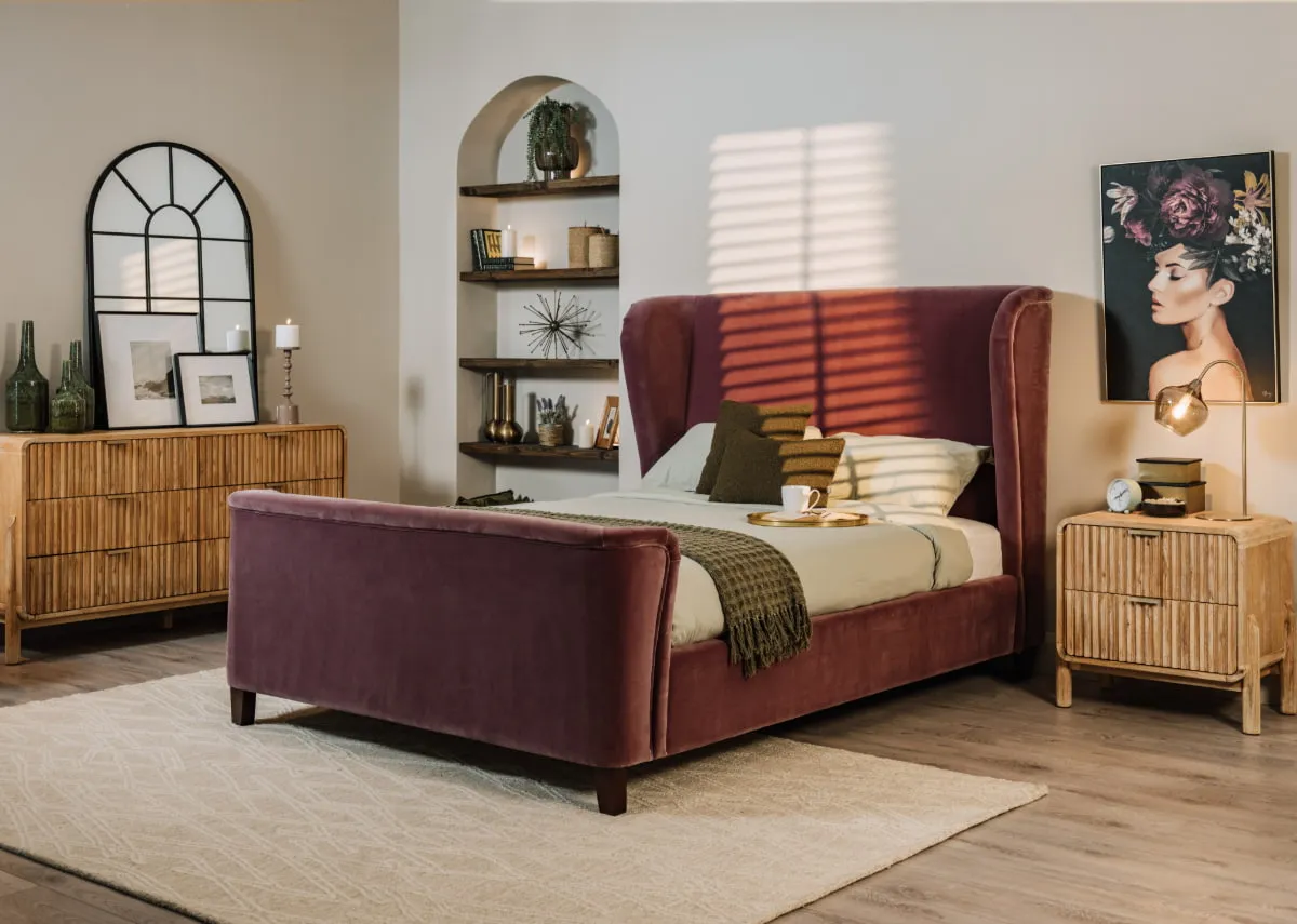 A lifestyle image of the Maison bed with Milo locker and chest and Lily canvas