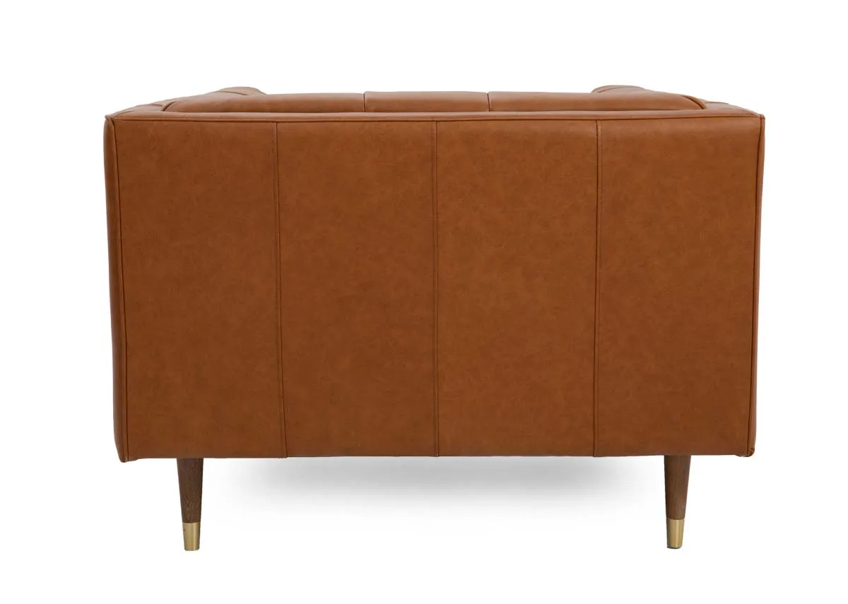 A tan leather armchair with button detail from EZ Livings Grace range. Side view