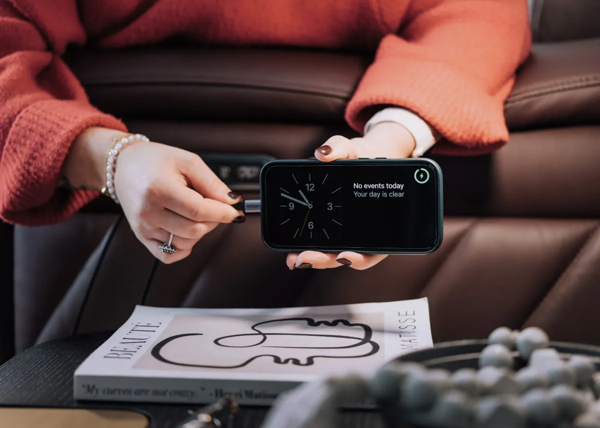 A lifestyle image of the Paige 3 seater recliner with usb charging port