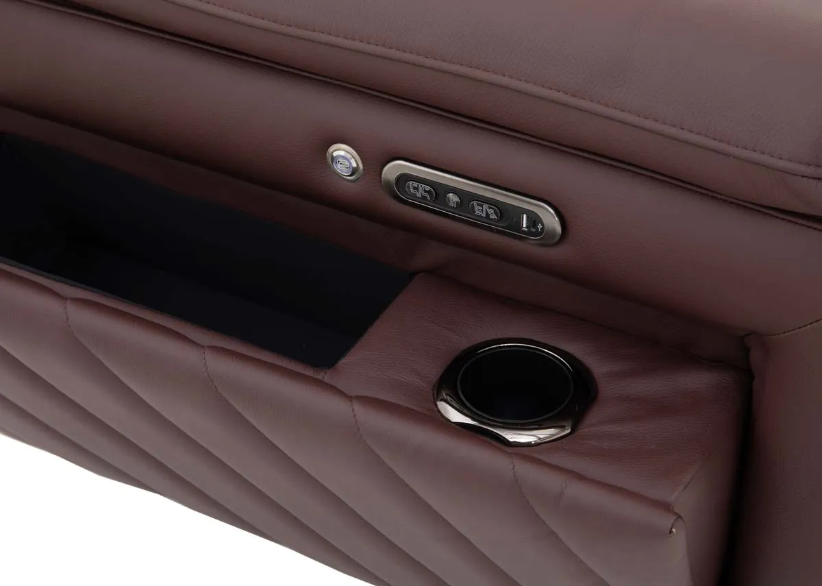 A brown leather power recliner from EZ Livings Paige range. Closeup of cup holder and storage slot under armrest
