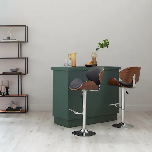 The Java black faux leather and walnut bar stools from EZ Living Furniture.