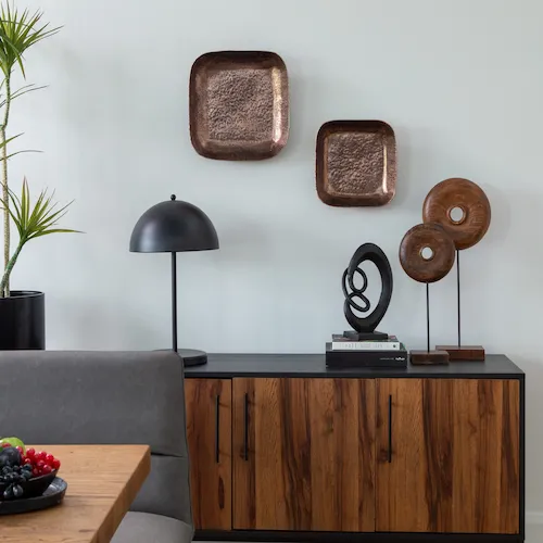 Neva copper bowls used as 3D art on walls from EZ Living Furniture.