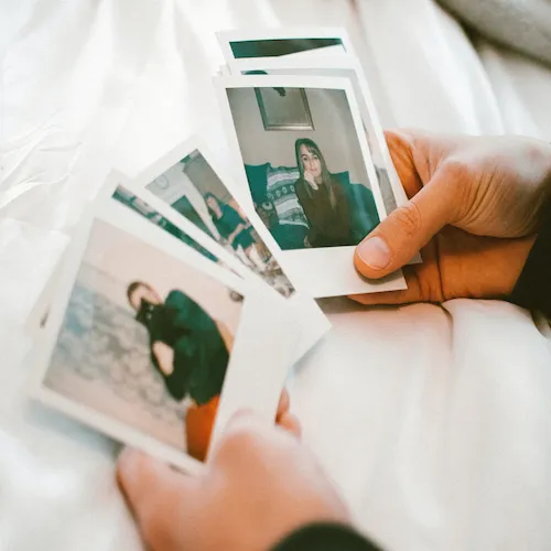 Polaroid photographs of people.