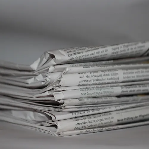 Stack of newspapers.