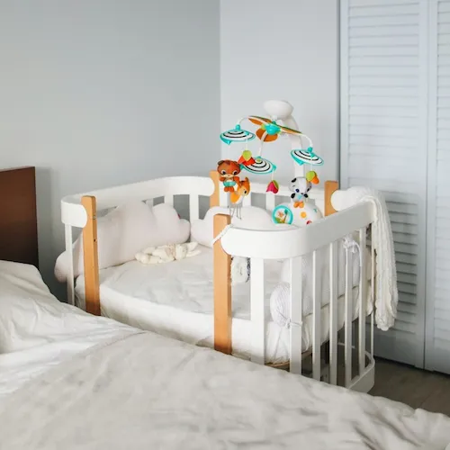 Baby's crib with mattress.