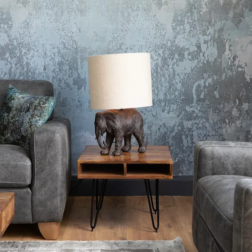 Elephant table lamp with white shade from EZ Living Furniture.