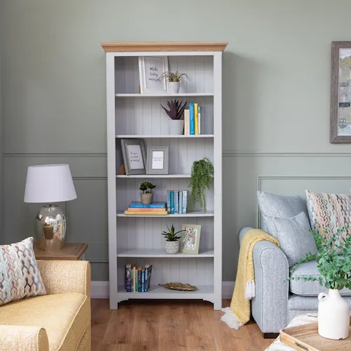 Osman photo frames on bookcase from EZ Living Furniture.