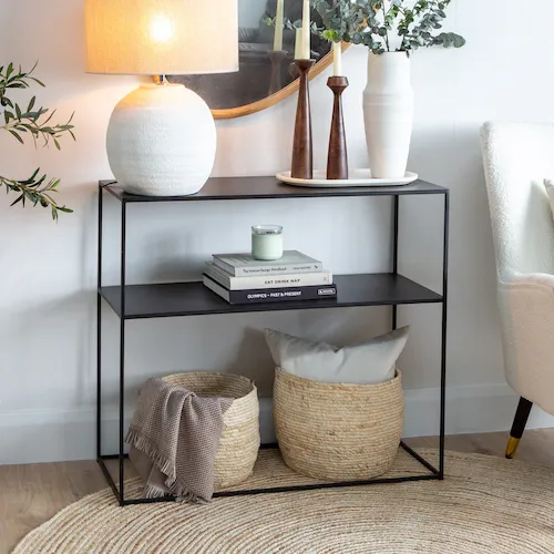 Pebble black metal console table from EZ Living Furniture.