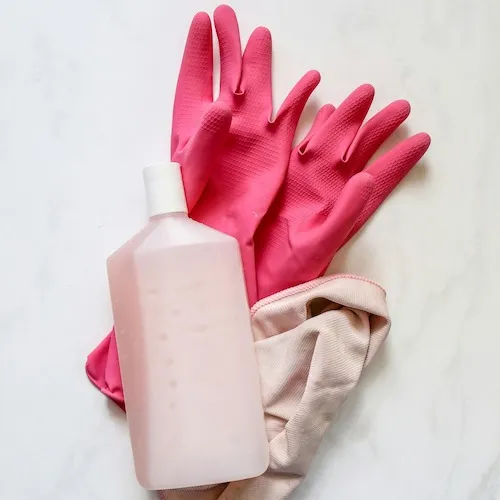 Rubber gloves and cleaning solution