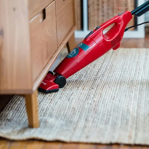 Vacuuming a rug