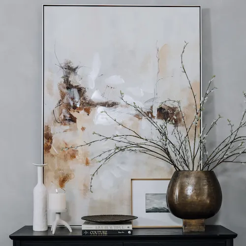 A  grouping of accessories and wall art from EZ Living Furniture.