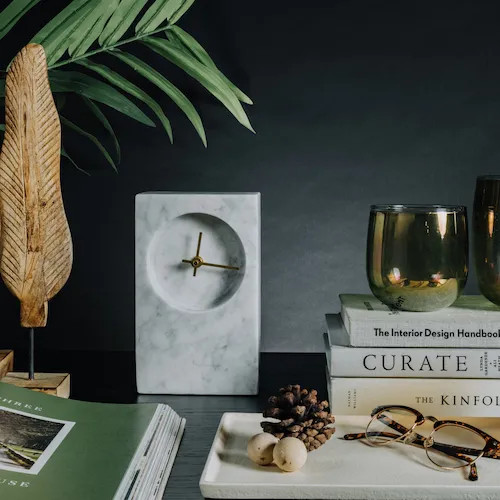 Destina Marble Clock with a mixture of accessories from EZ Living Furniture.