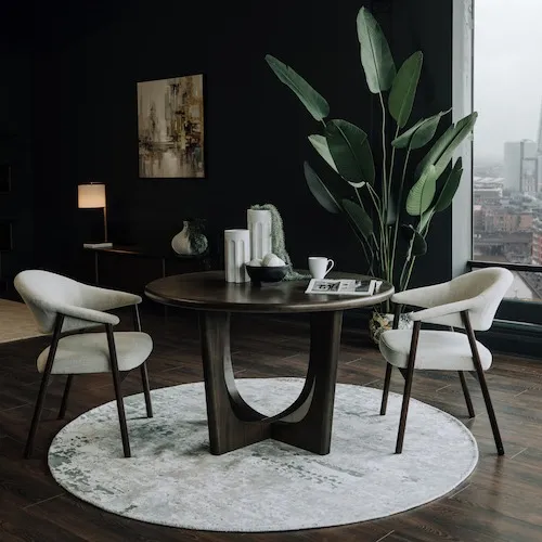 Flow Dark Brown Round Dining Table from EZ Living Furniture.