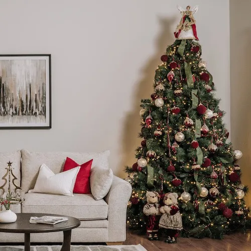 Sherwood Christmas Tree decorated in red theme at EZ Living Furniture.