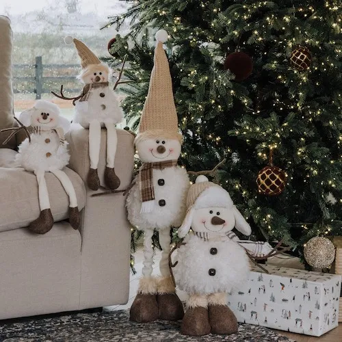 Christmas standing plush figurines at EZ Living Furniture.