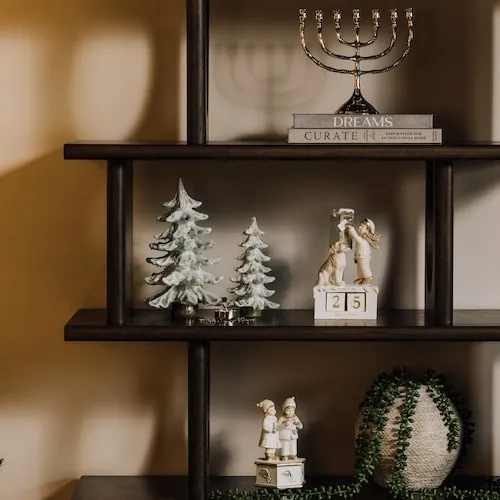 Christmas ornaments on display on shelf at EZ Living Furniture.