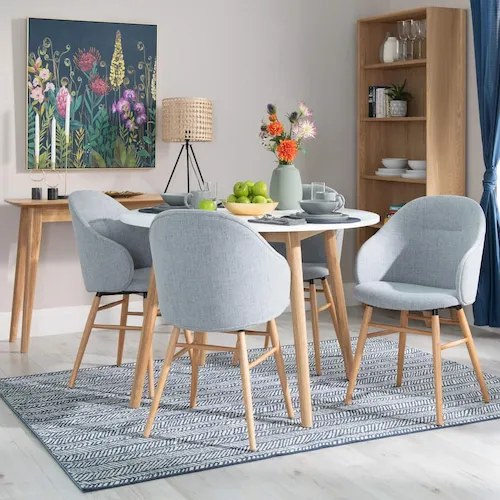 Teno dining chairs with Tia round dining table from EZ Living Furniture.