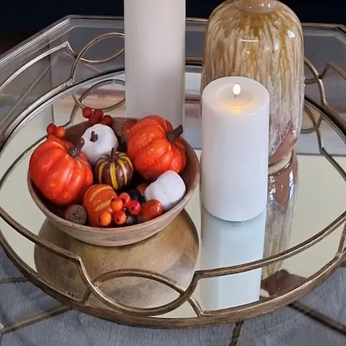 Decorative bowl of gourds.
