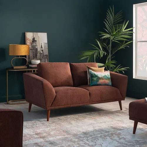 Modesto large peach rug with Freya Rust Sofa from EZ Living Furniture.