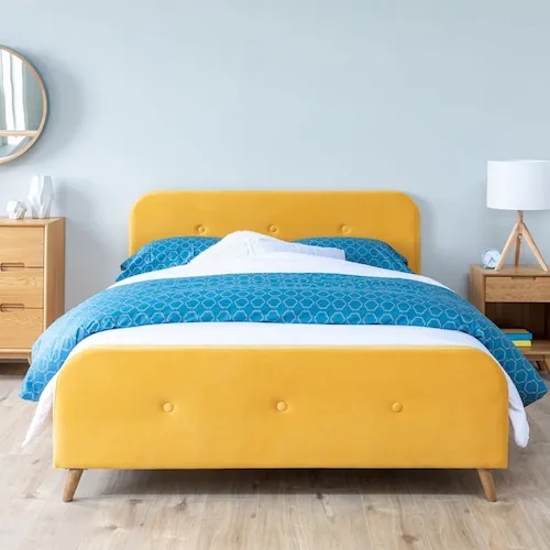 Serena yellow bed frame and beautiful bed linen from EZ Living Furniture.
