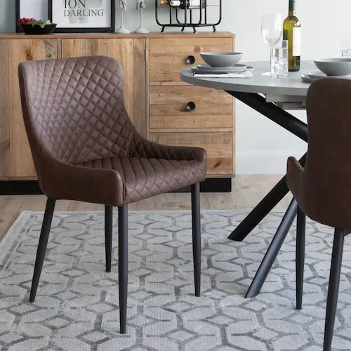 Brown faux leather Ottowa dining chairs from EZ Living Furniture.