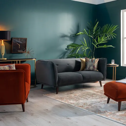 Girona grey velvet sofa with rust velvet armchair and footstool from EZ Living Furniture.