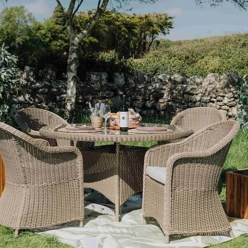Seville Round Garden Table With Seville Chairs from EZ Living Furniture.