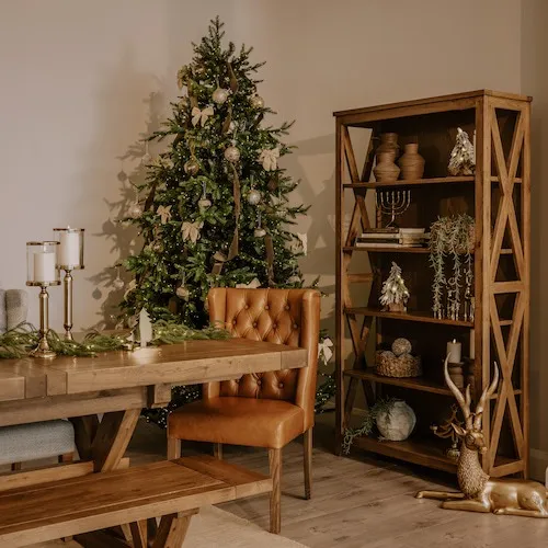 Christmas tree in a dining room at EZ Living Furniture.